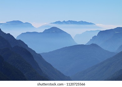 Alpine peaks, Doss del Sabion, Pinzolo, Trentino NorthernItaly. Breathtaking landscapes above 2100 Meters. Center of the Adamello Brenta natural park with beautiful thin mist layers over dolomite peak