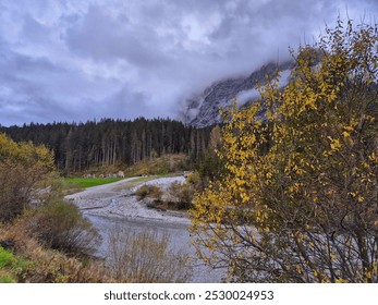 Alpine River Flowing Through a Dolomites Valley - Powered by Shutterstock