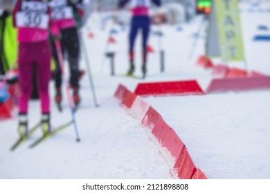 Alpine Skiing Race Slalom Competition, Athletes Ready To Start Ski Competitions On A Piste Slope, Nordic Ski Skier On The Track In Winter, Giant Slalom, Winter Sport And Acitivities Concept 