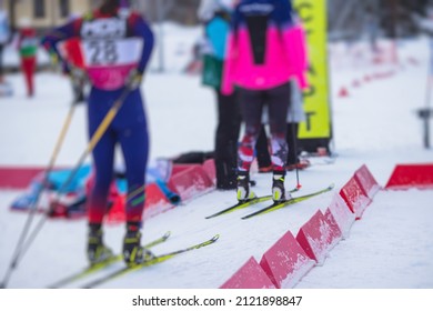 Alpine Skiing Race Slalom Competition, Athletes Ready To Start Ski Competitions On A Piste Slope, Nordic Ski Skier On The Track In Winter, Giant Slalom, Winter Sport And Acitivities Concept 