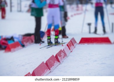 Alpine Skiing Race Slalom Competition, Athletes Ready To Start Ski Competitions On A Piste Slope, Nordic Ski Skier On The Track In Winter, Giant Slalom, Winter Sport And Acitivities Concept 