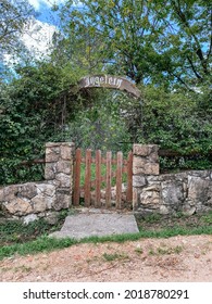 An Alpine Style Entrance With A Wooden Doorway