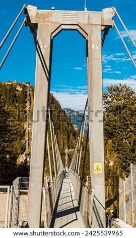 Alpine summer view at the famous Highline 179 suspension bridge and the Ehrenberg castle ruins near Reutte, Tyrol, Austria
