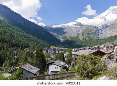Alpine town of Saas Fee in Saas valley surrounded by high mountains, Valais, Switzerland