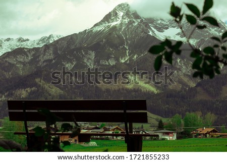 Similar – Foto Bild Young woman on the balcony who enjoys the view of the mountains