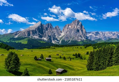 Alpine village in a mountain valley. Beautiful Alpine mountain valley in Alps. Summer Alpine mountains. Mountain valley landscape - Shutterstock ID 2185187611