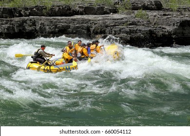 Alpine, Wyoming, USA June 26, 2016 A Family Rides A Rubber Raft On The White Water Rapids Of The Snake River In Western Wyoming.