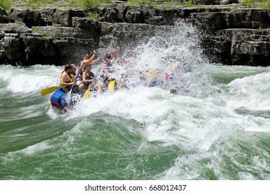 Alpine, Wyoming, USA June 26, 2016 A Family Rides A Rubber Raft On The White Water Rapids Of The Snake River In Western Wyoming.