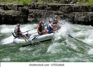 Alpine, Wyoming, USA June 26, 2016 A Family Rides A Rubber Raft On The White Water Rapids Of The Snake River In Western Wyoming.