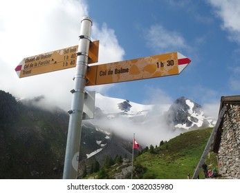 Alps, Switzerland - circa July 2016: 
Tourist signposts at shelter on the route from the Col de la Forclaz pass to the Col de Balme. Tour du Mont Blanc