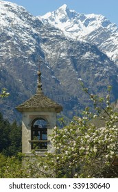 Alps view through a bell tower