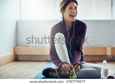 Alright, lets do this. Shot of an attractive young woman working out at home.