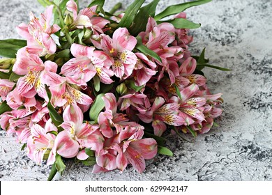 Alstroemeria Bouquet Of Flowers On Concrete Background