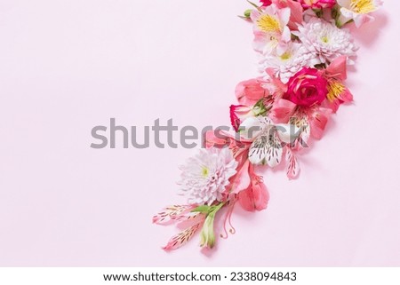alstroemeriaand chrysanthemums  flowers on pink background