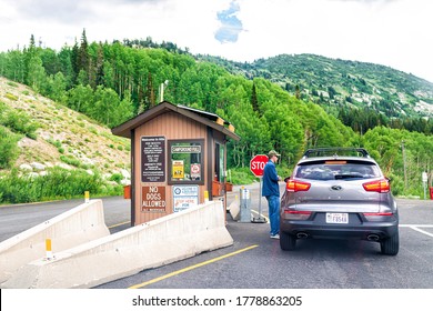 Alta, USA - July 25, 2019: Entrance With Information Sign To National Park Hiking Trails In Albion Basin, Utah Summer In Wasatch Mountains And Campground With Man Employee Worker