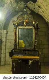 Altar in the Syriac chapel,  with Tomb of Joseph of Arimathea with Tomb of Joseph of Arimathea, inside of the hurch of the Holy Sepulchre, Jerusalem, Israel.