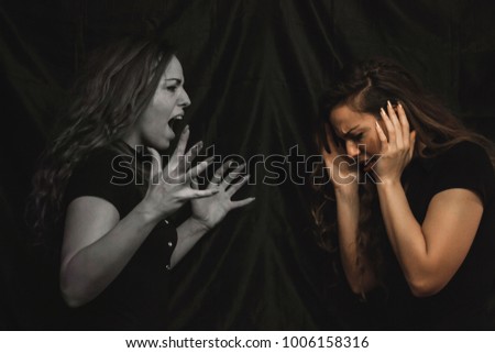 Alterego girl, one side of girl screaming and another side is scared