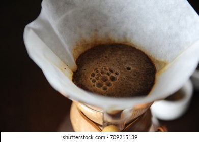 Alternative brewing of coffee in paper filter close up