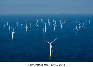 Alternative energy - Aerial view of offshore windmill park at sea. - Shutterstock ID 1398602918