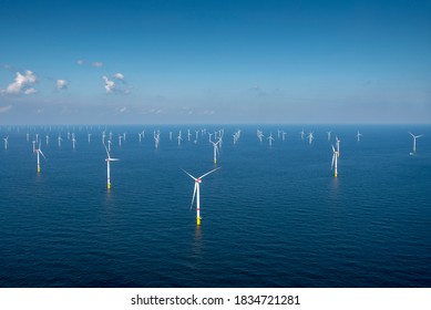 Alternative Energy - Aerial View Of Offshore Windmill Park At Sea.