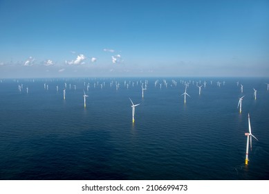 Alternative Energy - Aerial View Of Offshore Windmill Park At Sea.