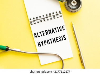 ALTERNATIVE HYPOTHESIS Is Written In A Notebook On A Color Table Next To Pen And A Stethoscope. Medical Concept