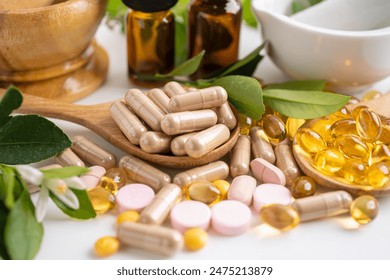 Alternative medicine herbal organic capsule with vitamin E omega 3 fish oil, mineral, drug with herbs leaf natural supplements for healthy good life.