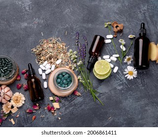 Alternative medicine variation pills and herbs. Homeopathy medicine concept. Top view, flat lay, copy space