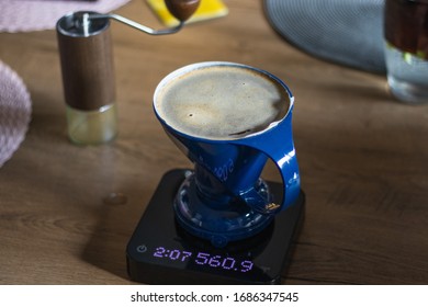 Alternative method of coffee brewing. Pour over dripper on Scales