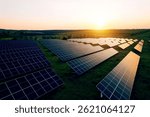 Alternative power source to saving environment.Solar panels park generating green energy electric at sunset.Green energy reduce carbon emissions and makes earth cleaner and more ecological