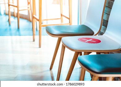 Alternative seating mark for social distance rules in the cafe distance for one seat from other people to protect from Corona Virus(COVID-19), social distancing for infection risk.New normal lifestyle - Shutterstock ID 1786029893