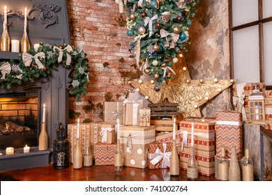 alternative tree upside down on the ceiling. Winter home decor. Christmas in loft interior against brick wall.