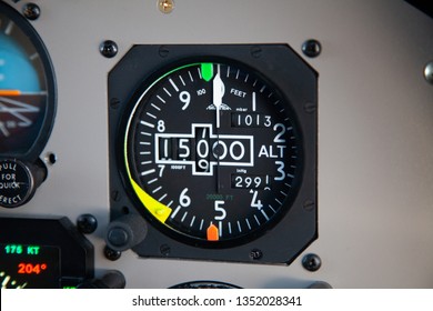 Altimeter In An Airplane Cockpit, 15000ft On Standard Setting. Above Transition Altitude All Airplane Altimeters Are Set To 1013 Mbar Or 29.92 InHg.