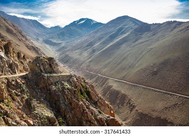 Altitude Road And Snowy Rock Mountain Rage In Summer  