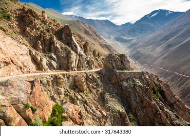 Altitude Road And Snowy Rock Mountain Rage In Summer  