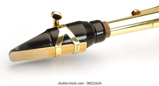 Alto Saxophone Mouthpiece With Reed On White Background