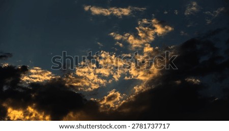 Altocumulus cloud study at dusk with beautiful impressionistic tapestry of textured light and shadow.