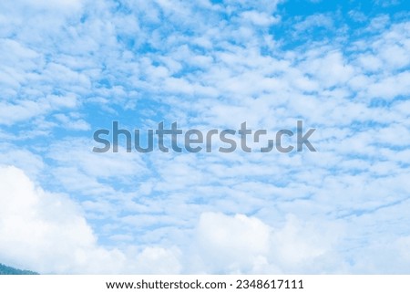 Altocumulus clouds in the blue sky at sunny day ,Blue Sky Background with White Clouds,vast blue sky,little puffy clouds.