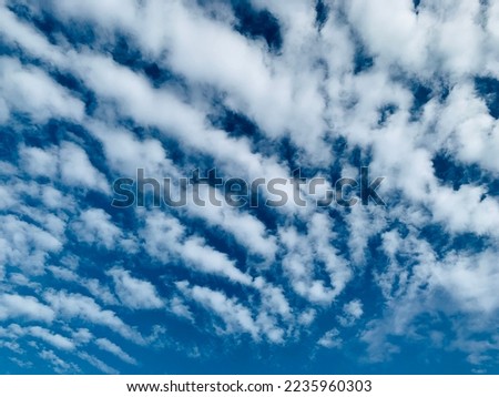Altocumulus clouds are full of streaks of beautiful usually appear between lower stratus clouds and higher cirrus clouds photographed over at Thailand.no focus