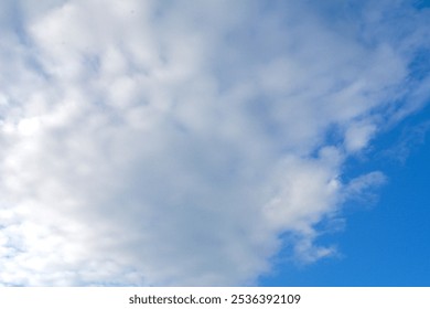 Altocumulus and altocumulus clouds in the sky