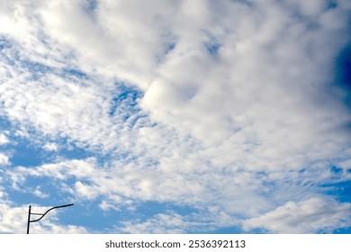 Altocumulus and altocumulus clouds in the sky