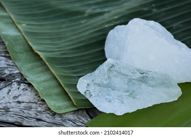 Alum Cubes On Banana Leaf, Blurred Background, Concept For Herb, Bodycare, Skincare, Waterclear And Protect Armpit Smell.	