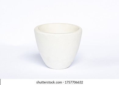 Alumina crucibles on white back ground,ceramic product with high thermal conductivity, compressive strength used under high temperature.