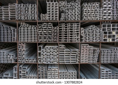 Aluminium bars stacked in the warehouse