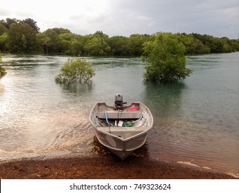 An Aluminium Boat In A River