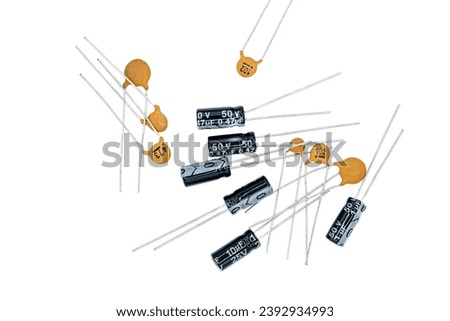 aluminium and ceramic capacitors isolated on white background top view