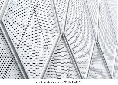 aluminium composite panels or cladding with perforated sheets on modern building facade, Abstract architecture background concept.