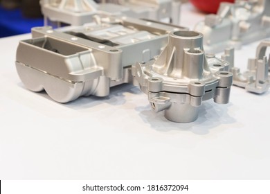 aluminium die casting products made from high pressure injection machine using molten metal and metal tooling or mold ; ADC12 ; engineering background ; high productivity - Powered by Shutterstock