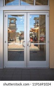 Aluminium Door And Chrome Door Handle With Glass In The Store