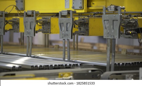 Aluminium extrusion production line factory warehouse. Plastic windows manufacture.